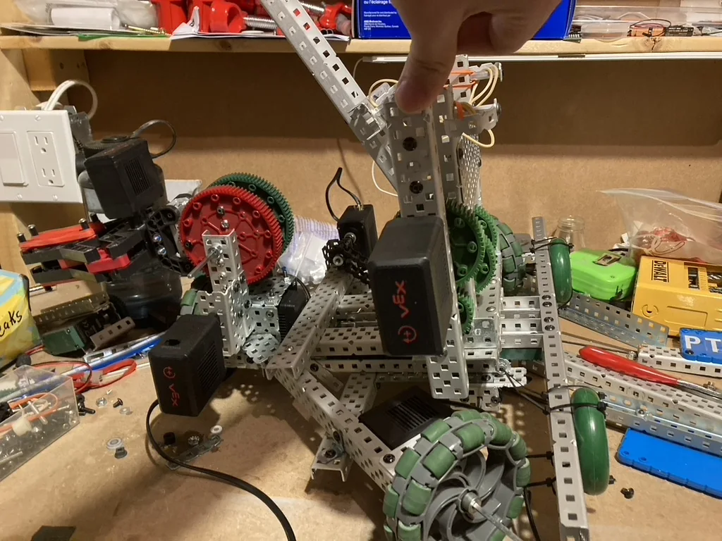 The VEX robot with its three-wheel omnidirectional drivetrain and mechanisms.