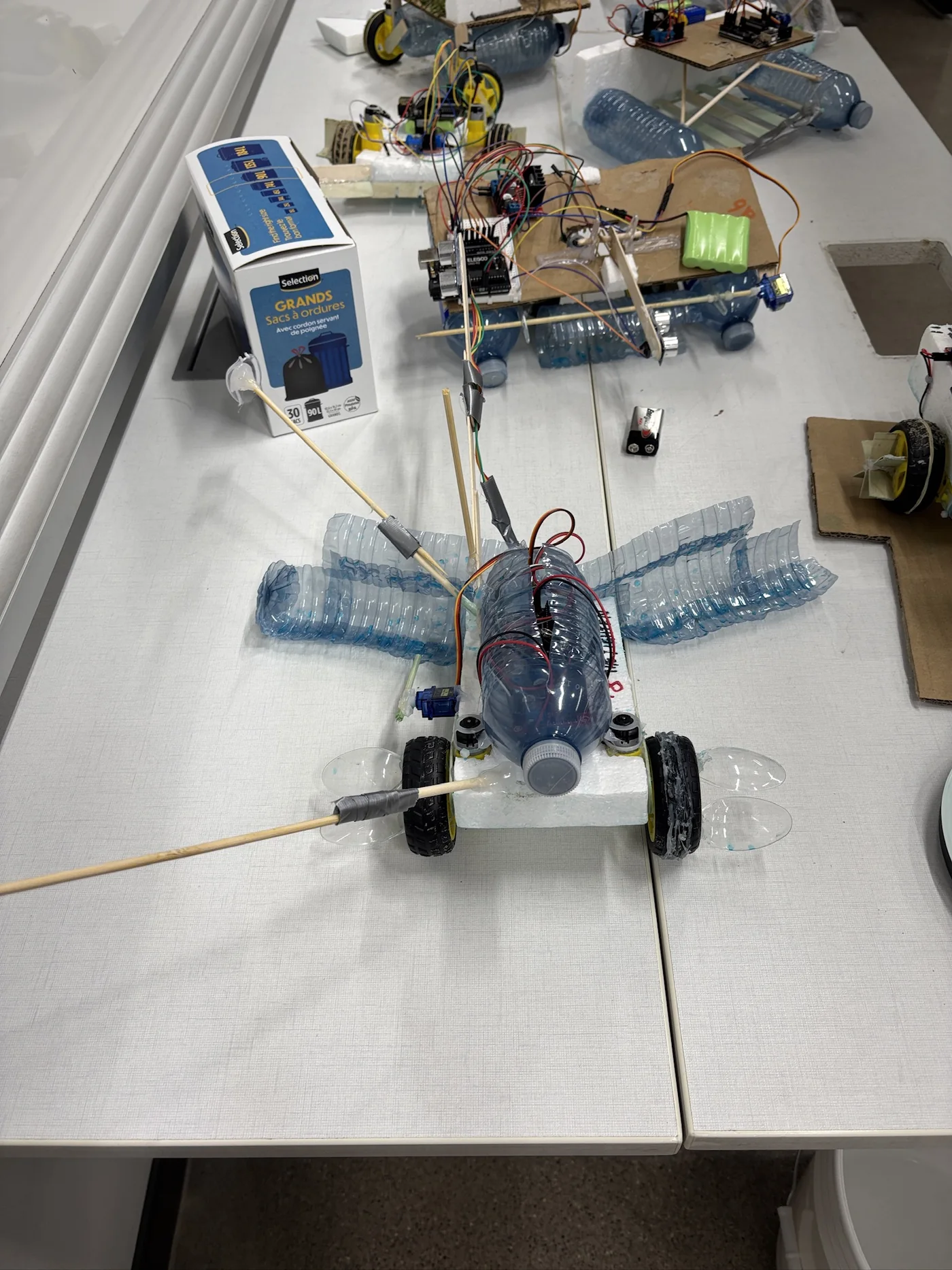 The amphibious WEC robot with a wide front collection mechanism.